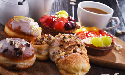 Composition with confectionery products and cup of coffee