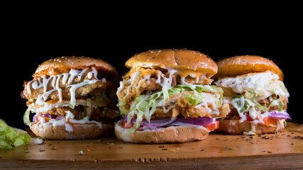 3 giant burgers in the dark