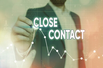 Writing note showing Close Contact. Business concept for having a history of direct exposure to a...