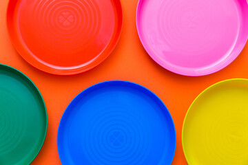Children's unbreakable multicolored dishes, serving for a children's holiday