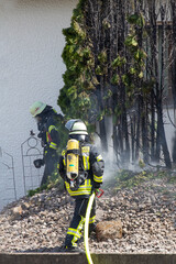 Fototapeta premium Feuerwehr beim löschen