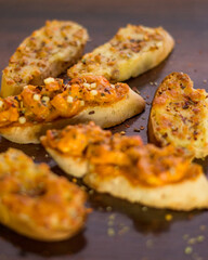 Garlic toast with stuffing in the top