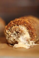 Meat roulade. Rolled meat with a filling of cheese and ham.