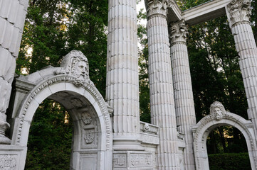 Greek Theatre columns and archways in the forest park of Guild Sculpture Gardens Toronto