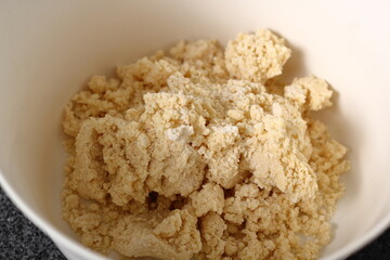 Shortcrust pastry dough in bowl. Making Shoofly Tart Series.