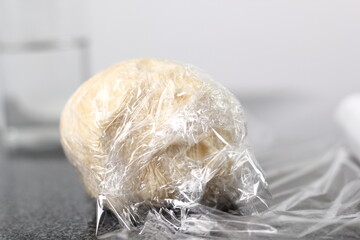 Wrap dough ball in plastic film. Making Shoofly Tart Series.