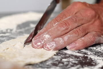 Cutting pastry trimmings into strips. Making Shoofly Tart Series.