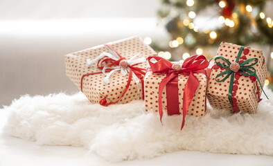 New year holiday background with a gift box in a cozy atmosphere.