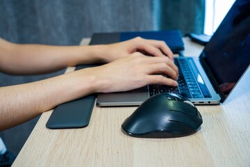 man working on laptop at home