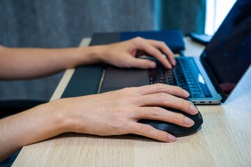 man working on laptop at home