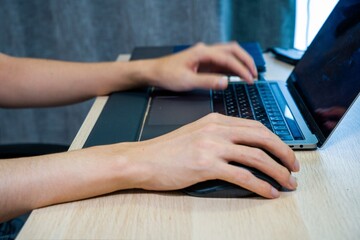 man working on laptop at home