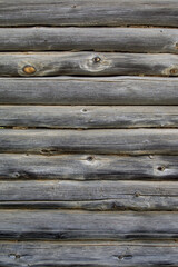 wall of old logs of a residential village house