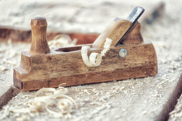 Old wooden planer - a tool for wood processing