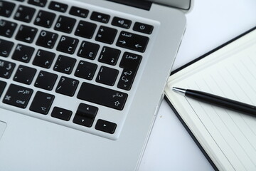 Business concept - Top view collection of black fly black notebook front, back and white open page, ballpoint pen isolated on background for mockup