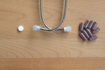 Comparing many pills of conventional or modern medicine versus many capsule of...