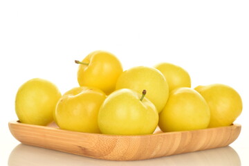 Ripe yellow plum, close-up, isolated on white.