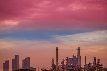 Fototapeta premium Blurred natural background of the morning sunshine along the river, breathtaking views (cargo ship, oil refinery), boat transportation