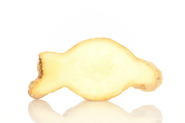 Ripe ginger root, close-up, on a white background.
