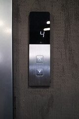 Elevator button going to the fourth floor.