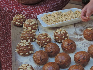 Pan'e saba cake, traditional dessert of Sardinia with wine syrup, raisins and almonds