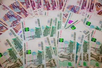 Modern cash Russian rubles. Paper bills laid out on the table