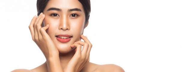 Beautiful Young Asian woman clean fresh skin with hands touching face isolated on white banner background. Facial treatment, Cosmetology, Beauty and skin care concept.