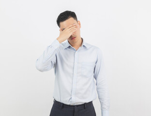 Young asian business man unhappy and frustrated with something. Negative facial expression isolated on white background.