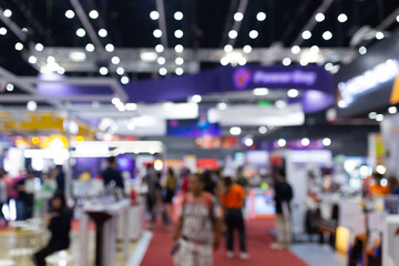 Abstract blur people in exhibition hall event trade show expo background. Business convention show, job fair, or stock market. Organization or company event, commercial trading. - obrazy, fototapety, plakaty