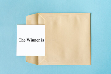 The winner is text with an envelope, competition and prize concept  - 364116079