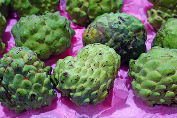 Annona fruit in bulk at a market