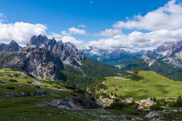 Fototapeta na wymiar Fantastic views down the Dolomites mountain valley at the start of Tre Cime di Lavaredo loop hike in Parco Naturale Tre Cime, South Tyrol, Italy