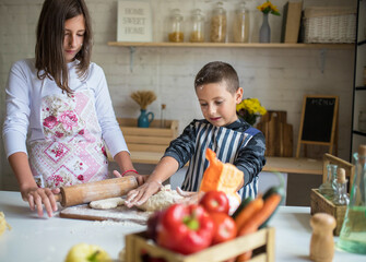 the family make cakes in the kitchen