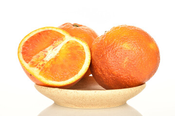 Juicy organic oranges, close-up, isolated on white.