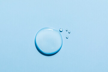close up of transparent moisturizing lotion on color background