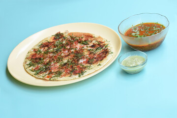 South Indian Food Uttapam Also Known As ooththappam, Rava Uttapam, Uttapa or Uthappa is a Popular South Indian Delicious Spicy Breakfast Snack Served with Coconut Chutney and Sambar