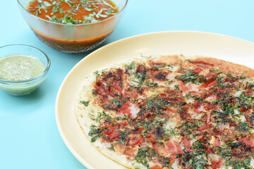 South Indian Food Uttapam Also Known As ooththappam, Rava Uttapam, Uttapa or Uthappa is a Popular South Indian Delicious Spicy Breakfast Snack Served with Coconut Chutney and Sambar