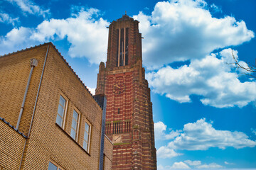 A part from the Martinus church in Weert the Netherlands with a cloudy and blue sky