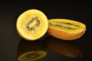 Ripe sweet organic kiwi, close-up, isolated on black.