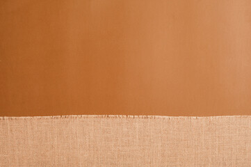 Natural linen texture, brown background.top view