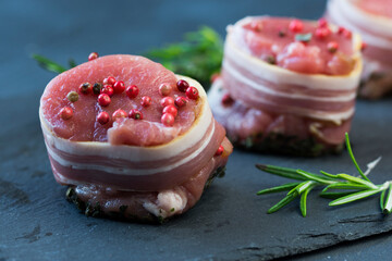 Pork tenderloin with bacon, rosemary and tarragon.