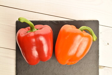 Sweet bell pepper, close-up, on a slate board.