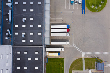 Aerial view of the distribution center, drone photography of the industrial logistic zone.