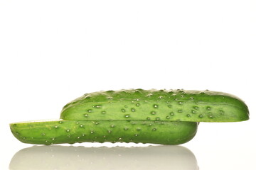 Fresh green cucumbers, close-up, isolated on white.
