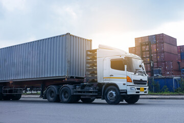 Container cargo truck in ship port Logistics.Transportation industry in port business concept.import,export logistic industrial Transporting Land transport freight warehouse storge