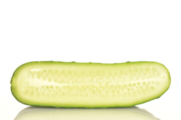 Fresh green cucumbers, close-up, isolated on white.
