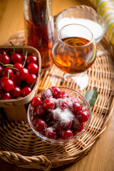 preparation of dessert, cherries in cognac
