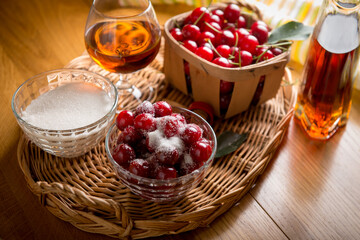 preparation of dessert, cherries in cognac