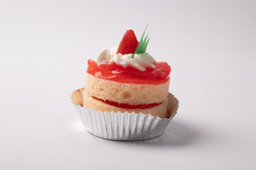 Strawberry cake on white background