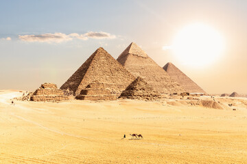 Fototapeta na wymiar Great Pyramids of Giza under the desert sun, Cairo, Egypt