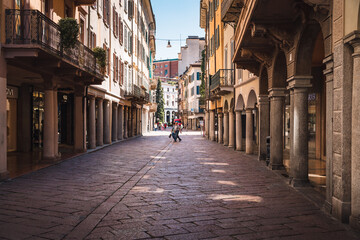 View of the city center with people walking, alleys